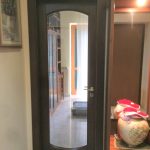 Porta massello con vetro semi-ovale