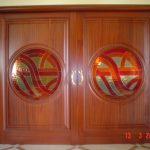 Porta a scomparsa con oblò in vetro